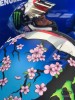 MotoGP: Alex Rins on the track in Motegi with a cherry blossom helmet